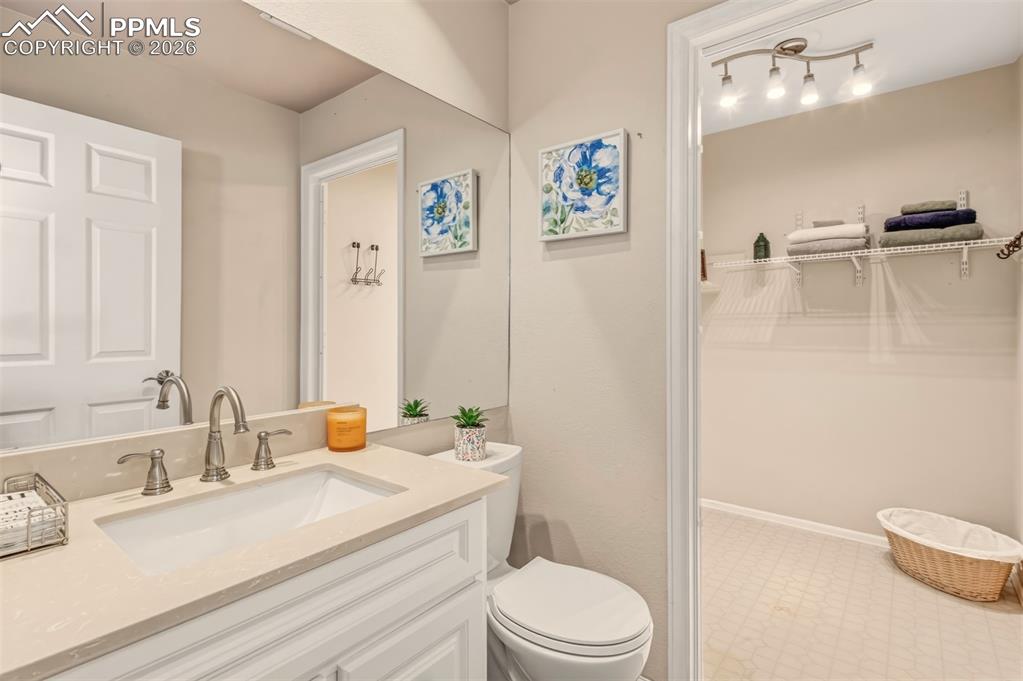 Image 19 of 30: Updated half bathroom.