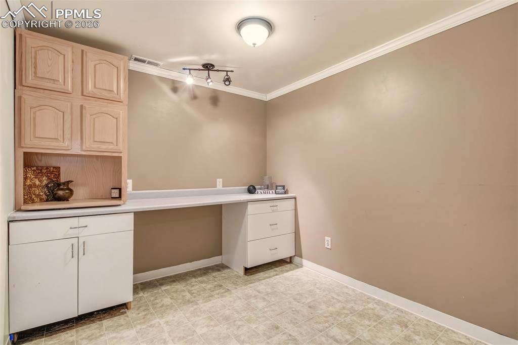 Image 28 of 30: Spacious storage room located in the basement.