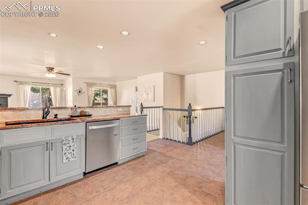 Image 6 of 30: Spacious kitchen with convenient pantry for added storage.