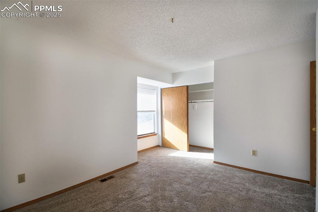 Image 9 of 15: Bedroom