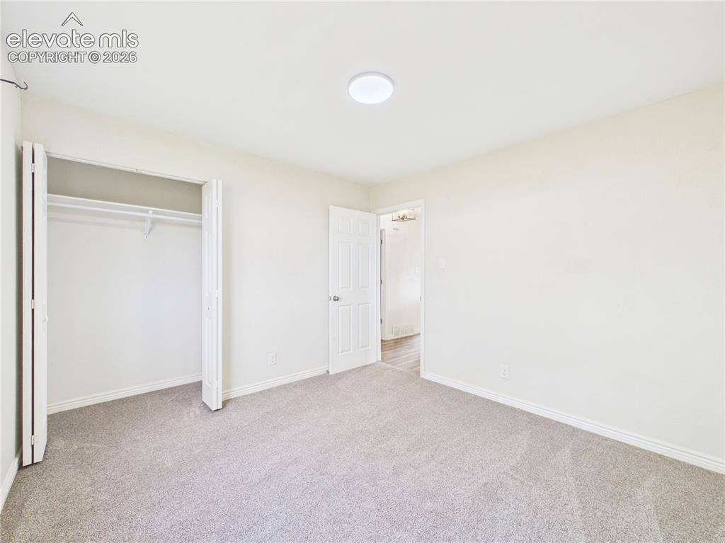 Image 19 of 38: Bedroom