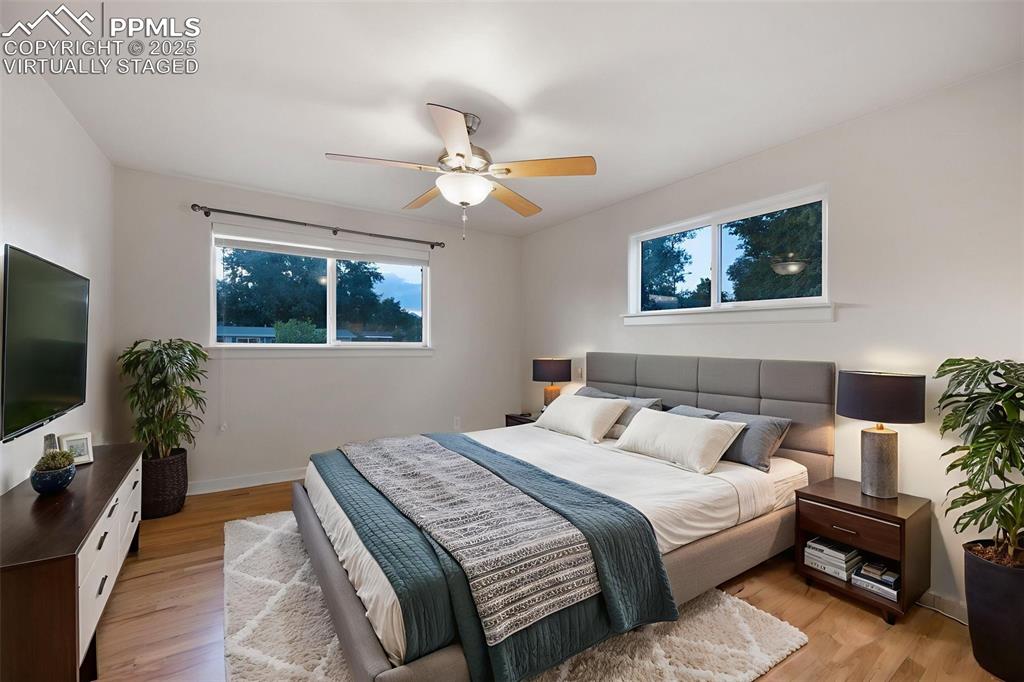 Image 20 of 43: virtually staged main bedroom