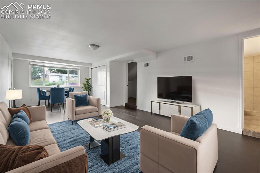 Image 33 of 43: virtually staged family room