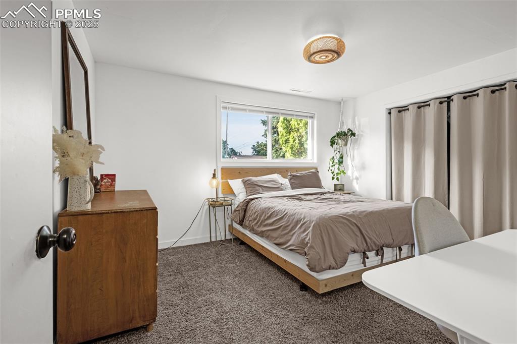 Image 21 of 32: Bedroom featuring carpet flooring and baseboards