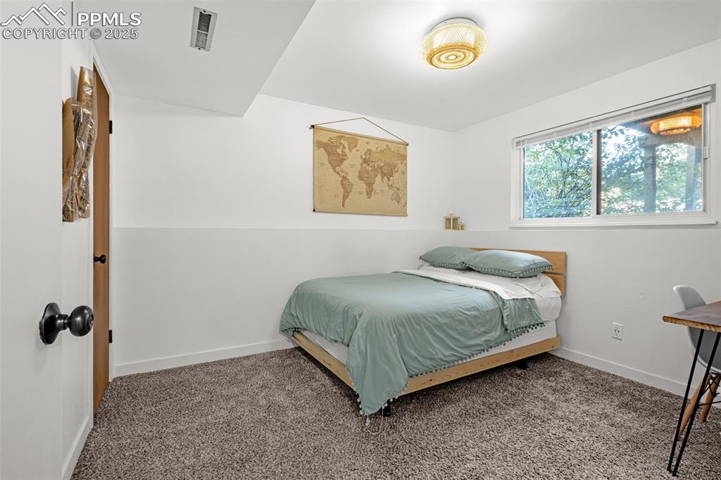 Image 22 of 32: Bedroom featuring carpet floors