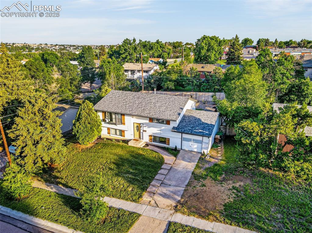 Image 25 of 32: Aerial view of property and surrounding area