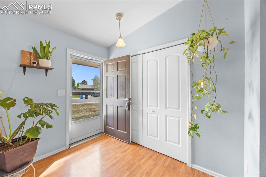 Image 18 of 50: Entrance foyer featuring light wood-type flooring and baseboards