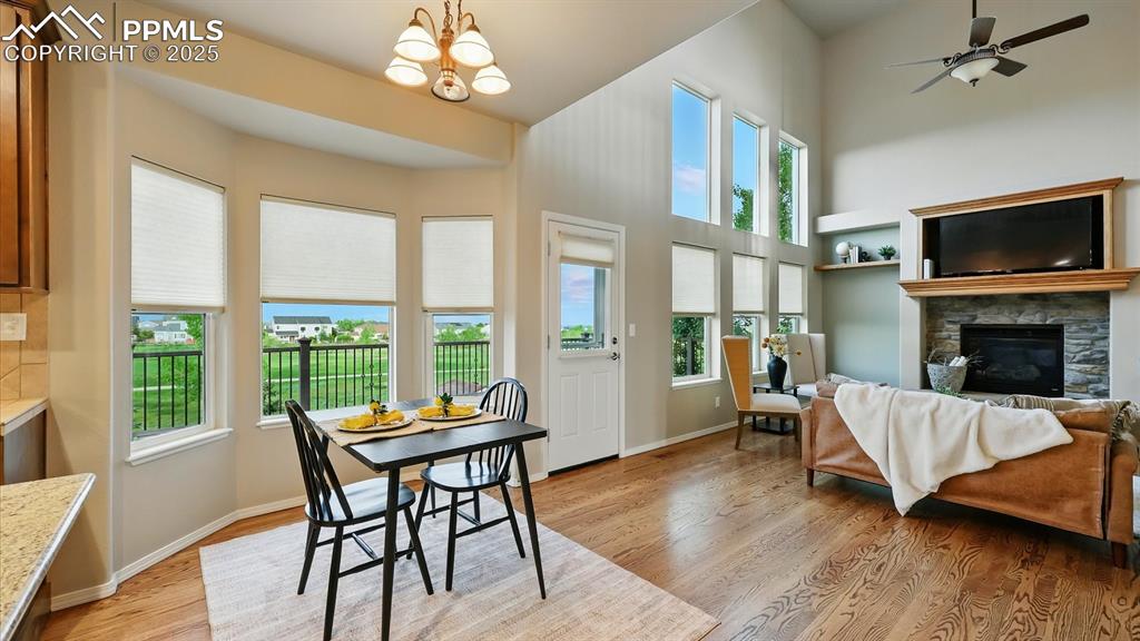 Image 26 of 50: Dining Nook with walk out to a composite deck.