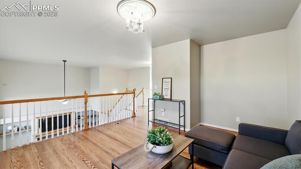Image 36 of 50: The large loft offers additional space for a 2nd office or creative retreat