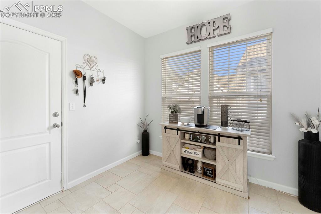 Image 11 of 47: Main Level Laundry walk out 