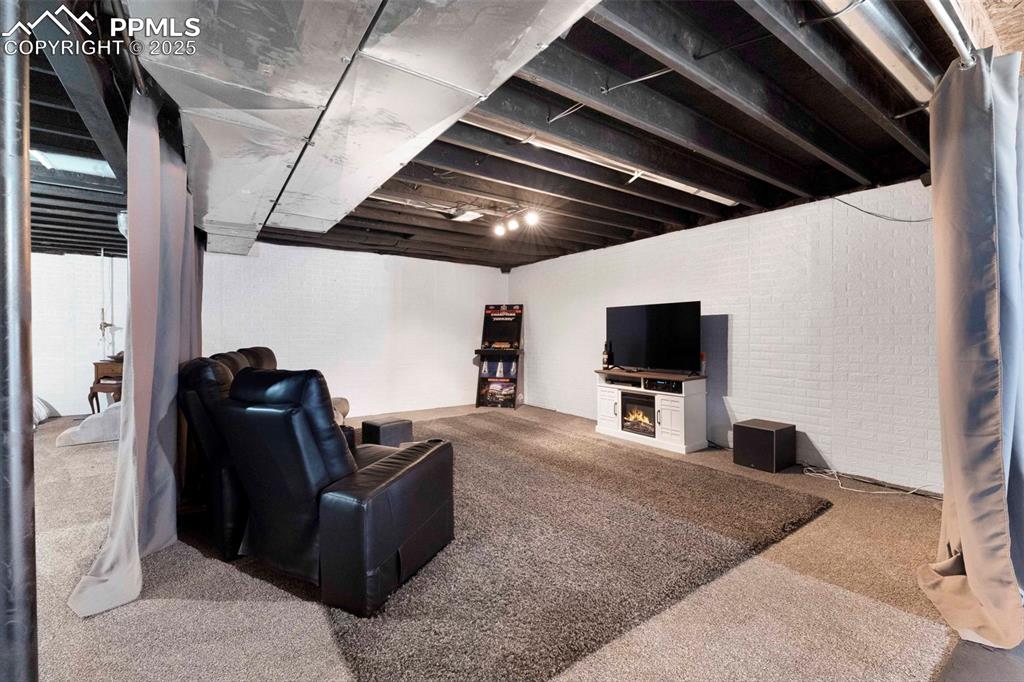 Image 23 of 47: Unfinished Basement Movie room