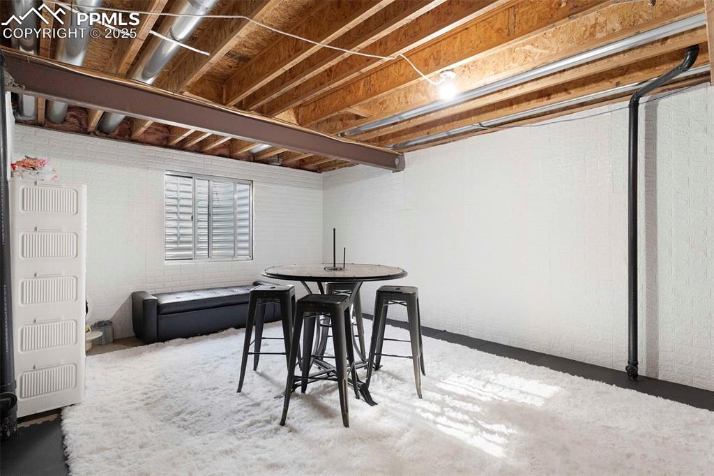 Image 24 of 47: Unfinished Basement Game room