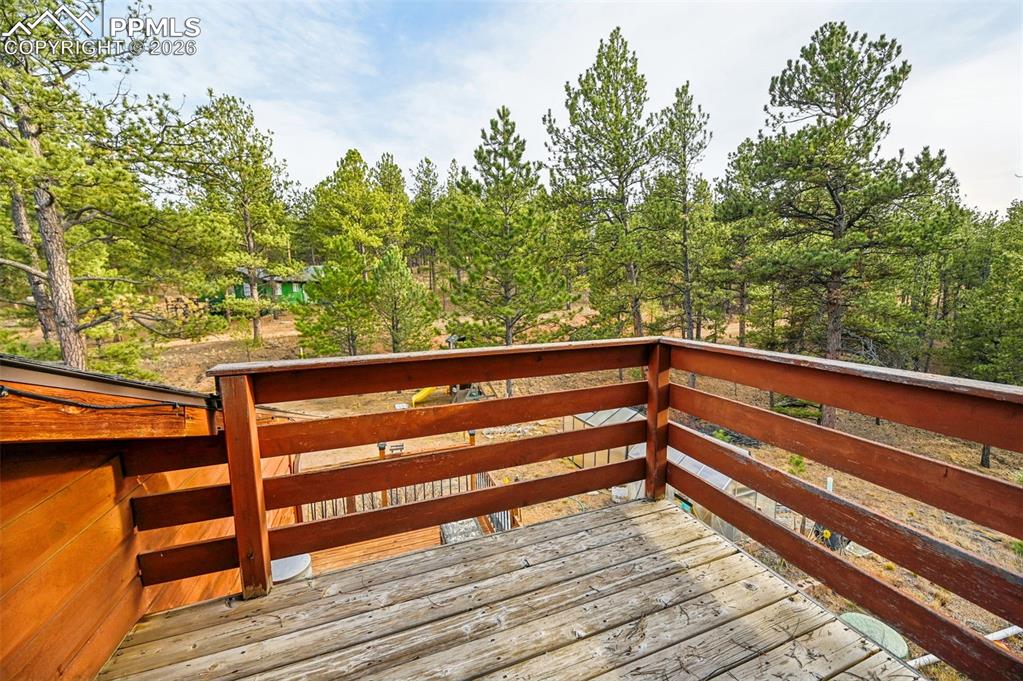 Image 13 of 31: Deck/balcony off Primary bedroom