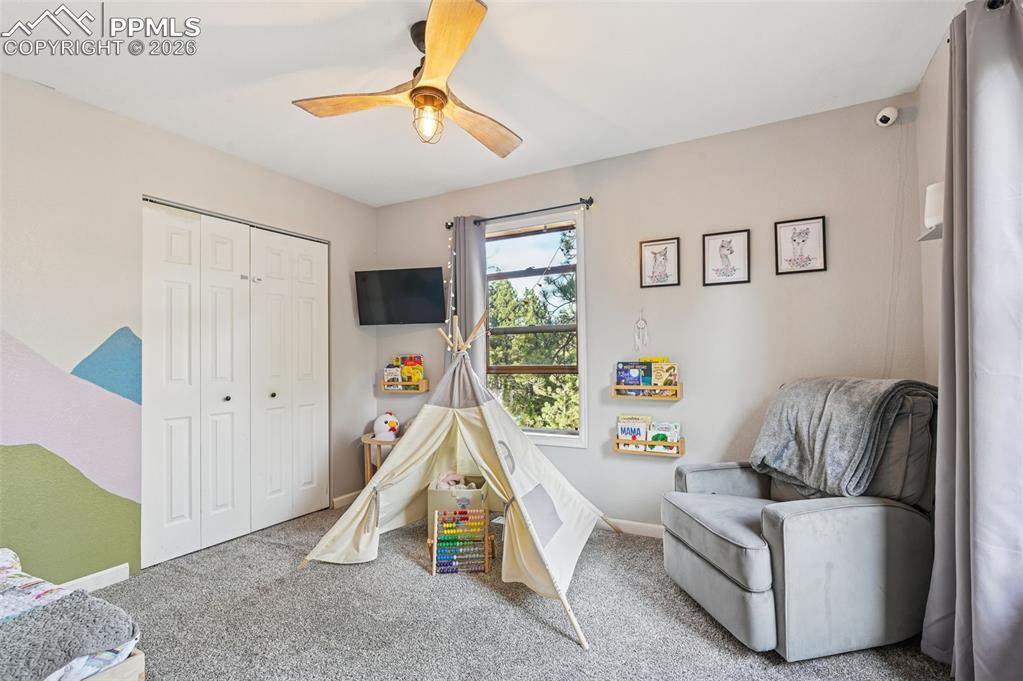 Image 17 of 25: upstairs bedroom