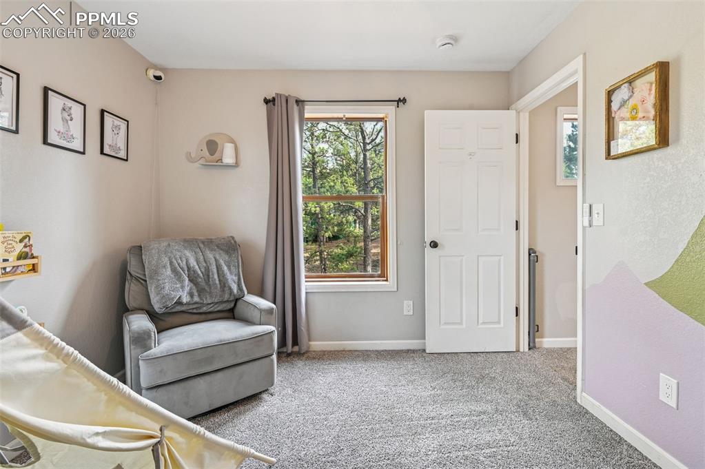 Image 18 of 25: upstairs bedroom 