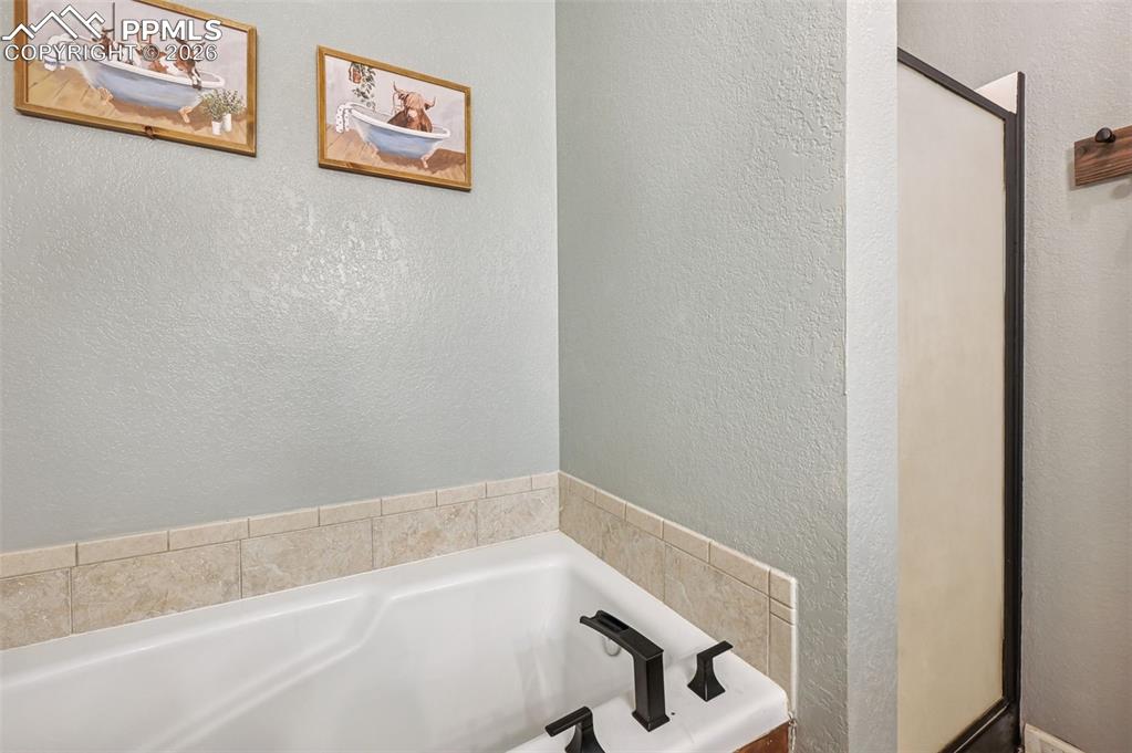 Image 9 of 25: Primary Bathroom en-suite