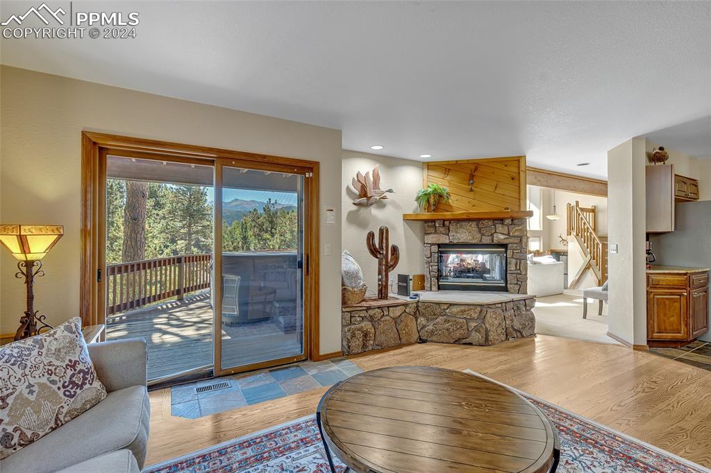 Image 12 of 39: Family Room, Gas Fireplace, Wooden Deck, Great Views,