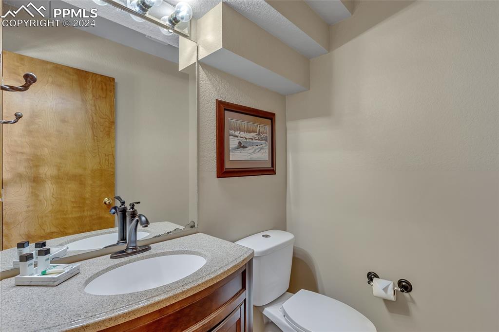 Image 13 of 39: Half Bath, Guests Bath, Main Level, Vanity