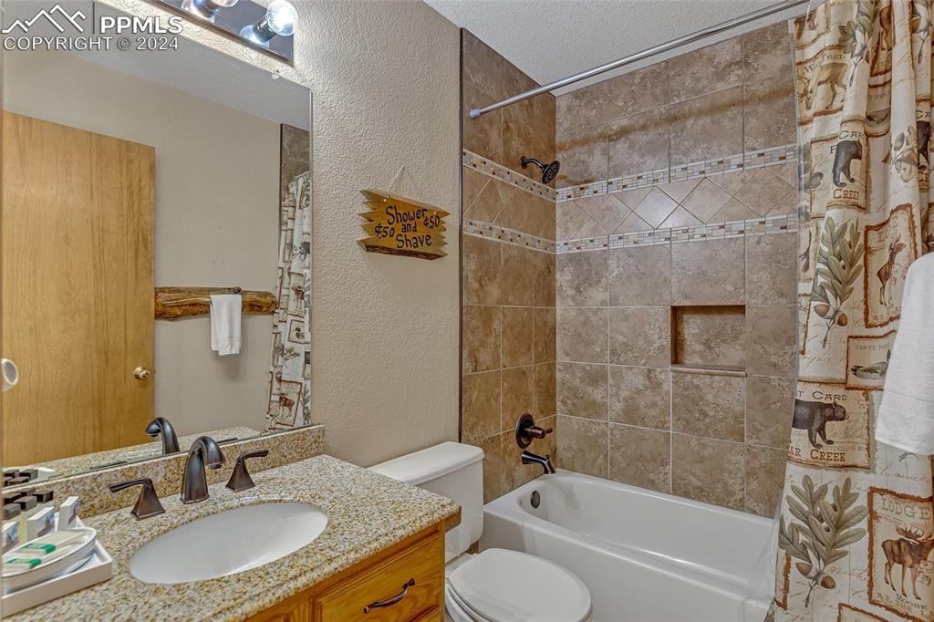 Image 21 of 39: Full Bathroom, Vanity, Shower, Tub,