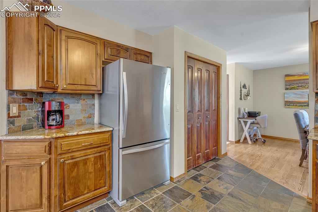 Image 8 of 39: Gorgeous Kitchen, Granite Countertops, Wooden Cabinets, Tile Floor, Attache
