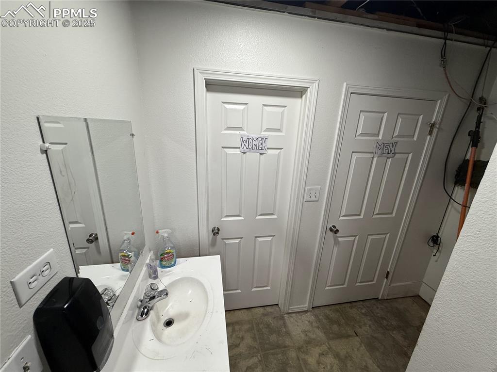 Image 27 of 28: Bathroom featuring vanity