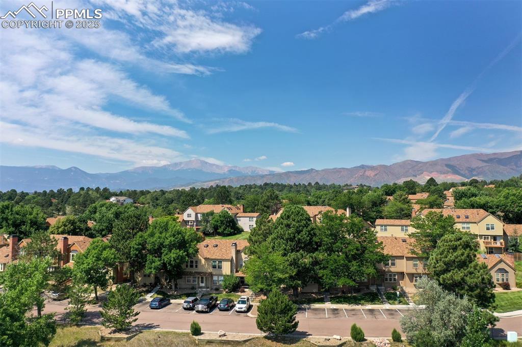Image 27 of 30: View of mountain backdrop with nearby suburban area