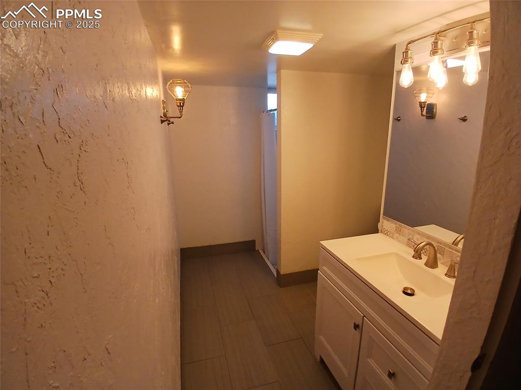 Image 44 of 49: Baesment Bathroom.