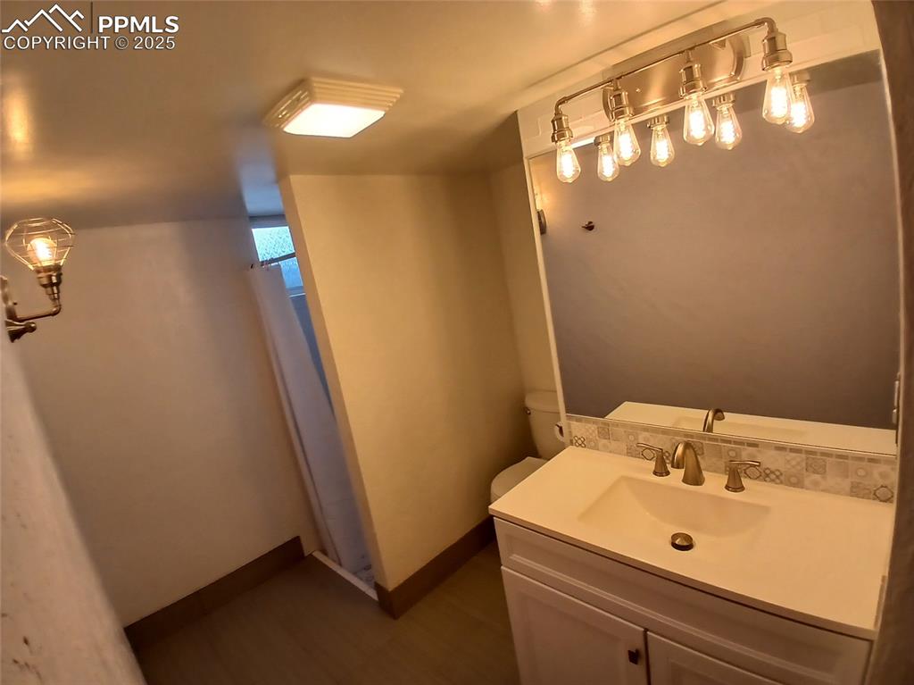 Image 45 of 49: Basement bathroom.