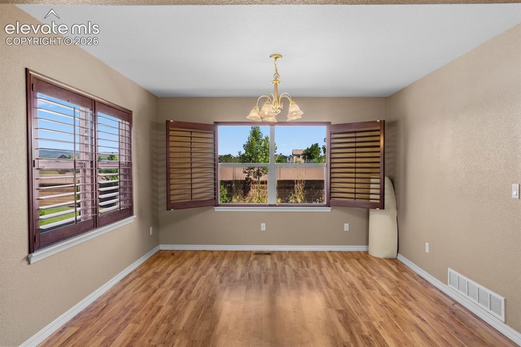 Image 9 of 27: Formal Living Room to Dining Room