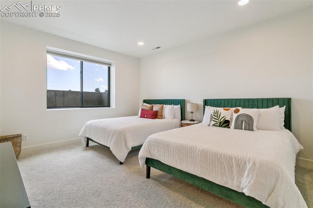 Image 45 of 50: One of 3 lower level bedrooms