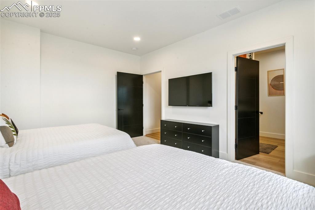 Image 46 of 50: One of 3 lower level bedrooms