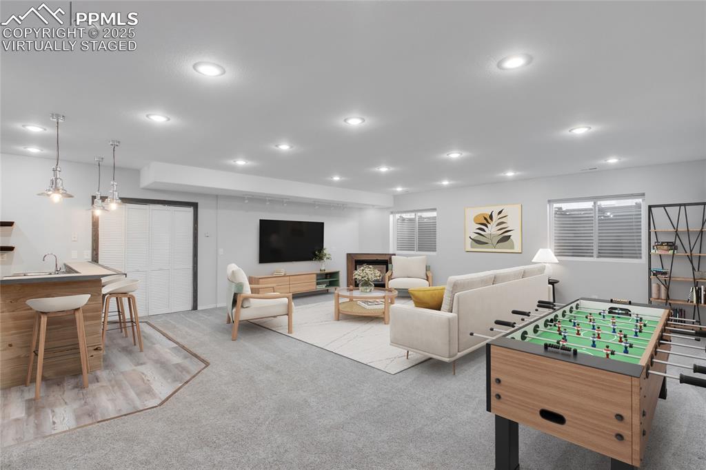 Image 5 of 45: Virtually Staged Lower-Level Family/Game Room