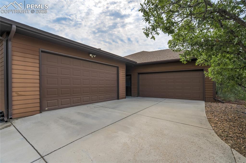 Image 2 of 50: Detached oversized 2 car garage