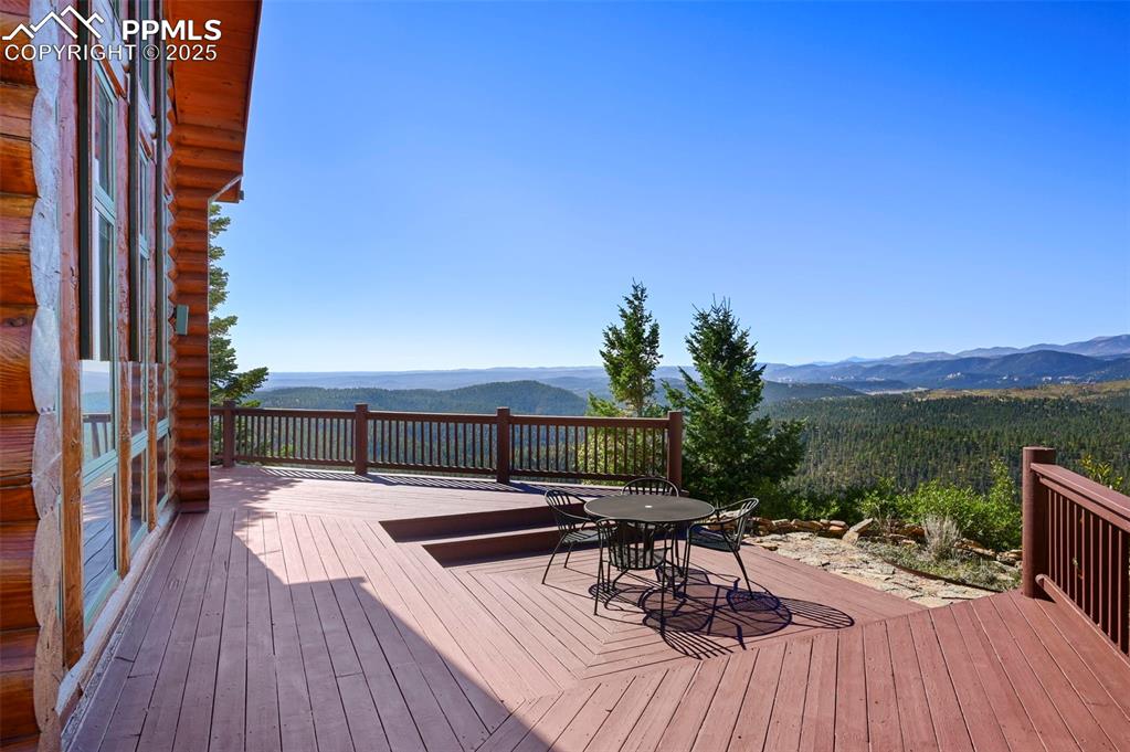 Image 33 of 50: Wooden deck with a mountain view