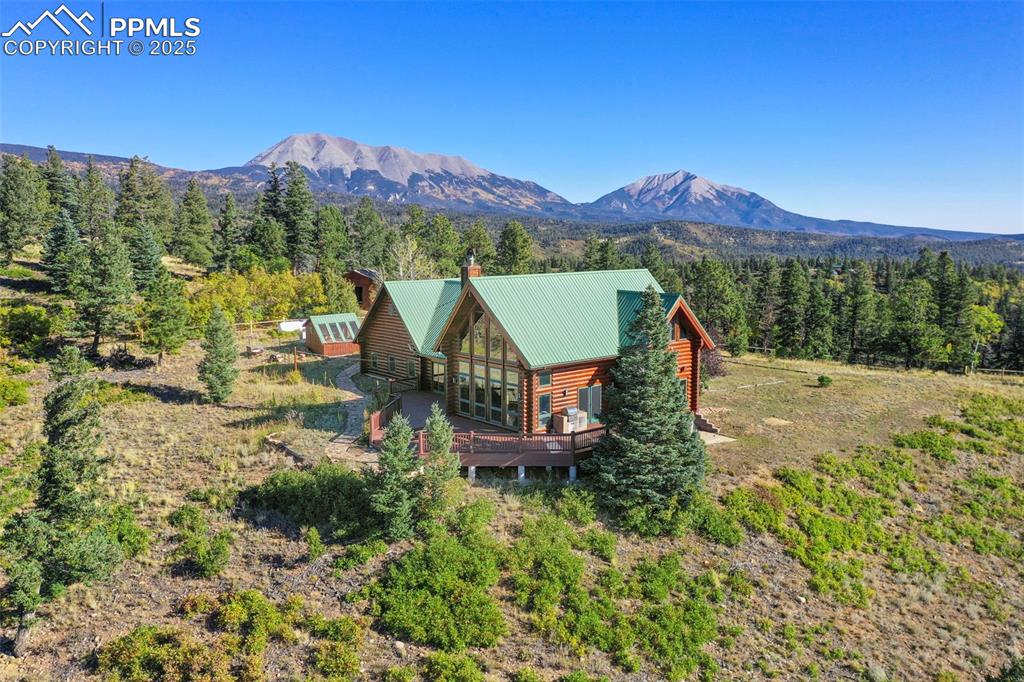 Image 39 of 50: View of mountain feature with a forest view