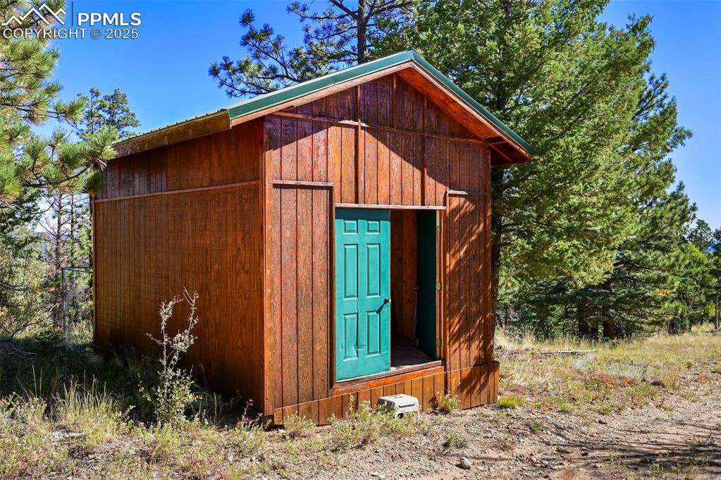 Image 42 of 50: View of outdoor structure featuring an outdoor structure