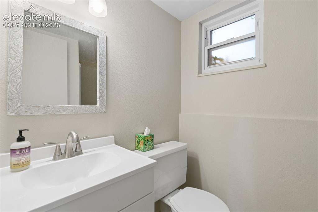 Image 24 of 48: New Vanity and tile flooring