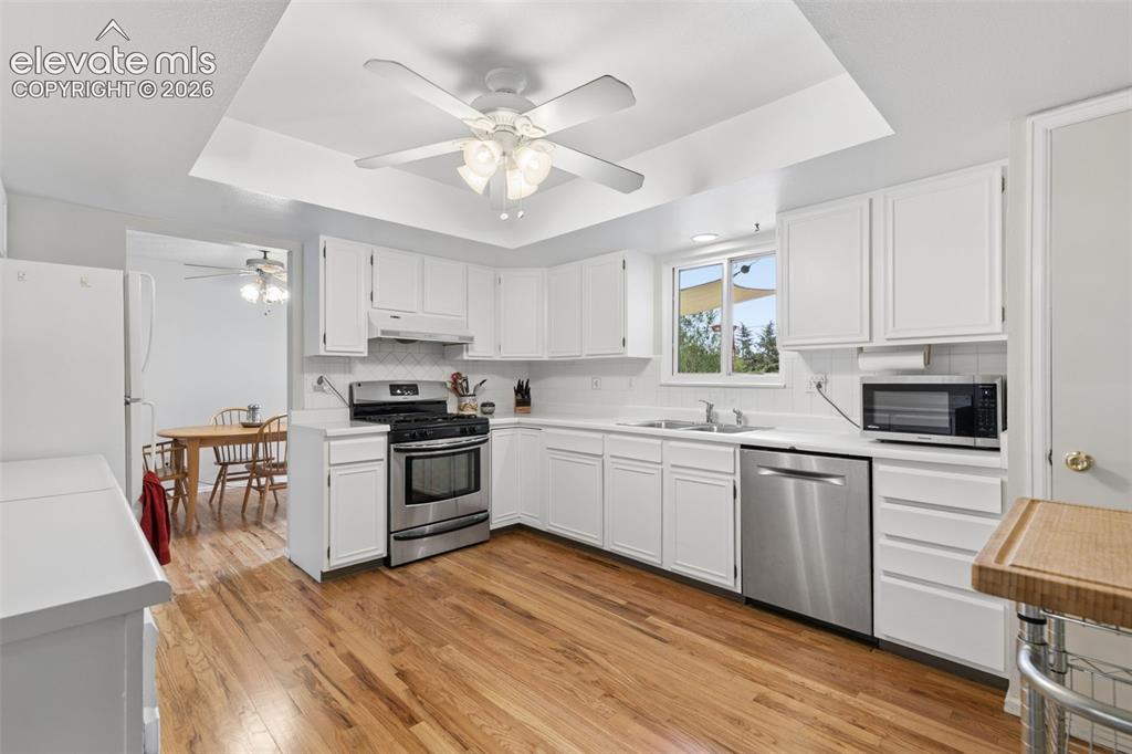 Image 3 of 48: Plenty of cabinets and countertop space