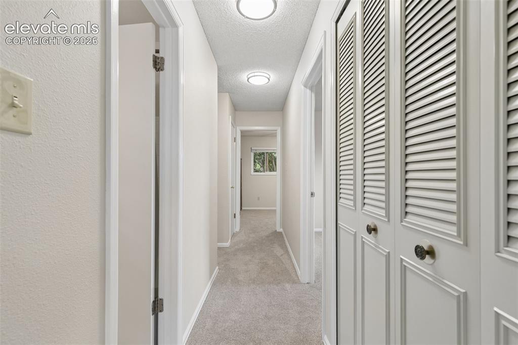 Image 32 of 48: 2 linen closets in hallway