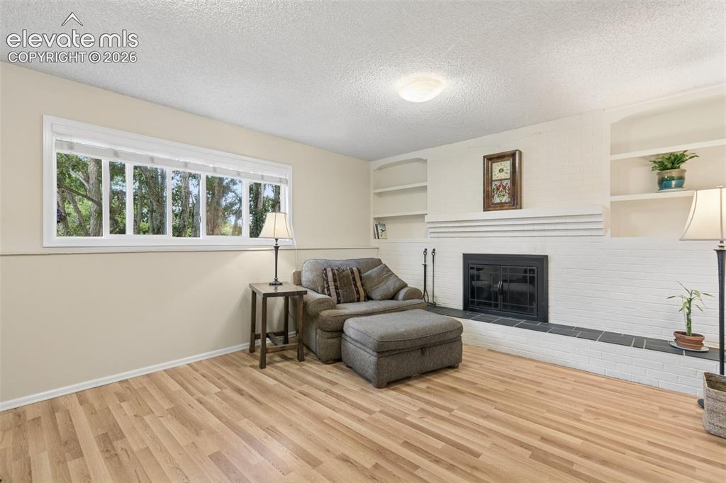 Image 4 of 48: Wood burning fireplace!