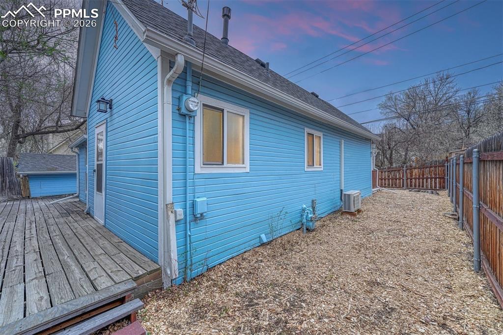 Image 25 of 30: Large private fenced yard ideal for pets and play