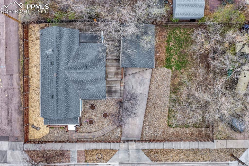 Image 30 of 30: Spacious backyard with room to garden or entertain. Zoned R-2