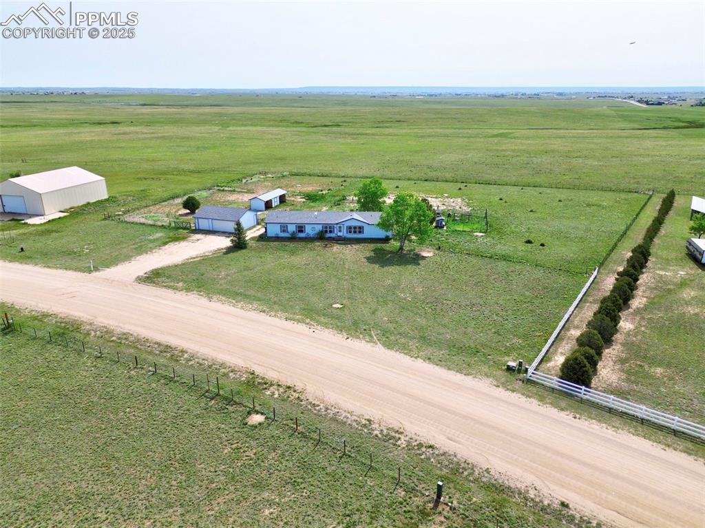 Image 44 of 48: Overview of rural landscape featuring a pastoral area