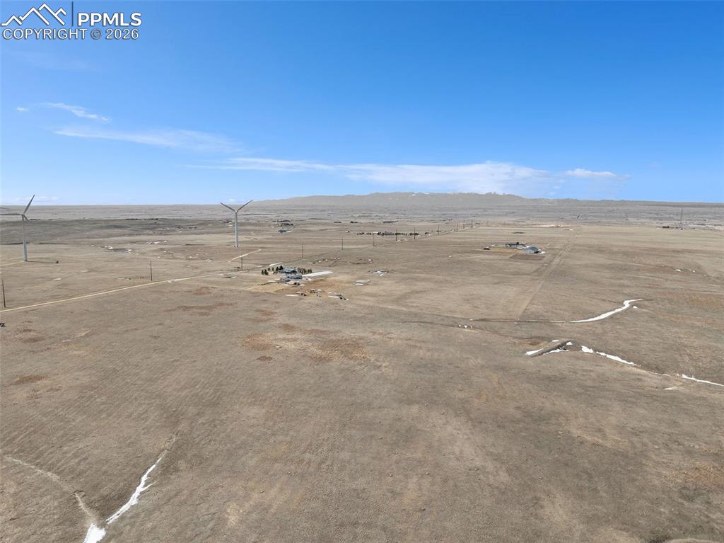 Image 10 of 17: View illustrating the rural setting and low-density development nearby.