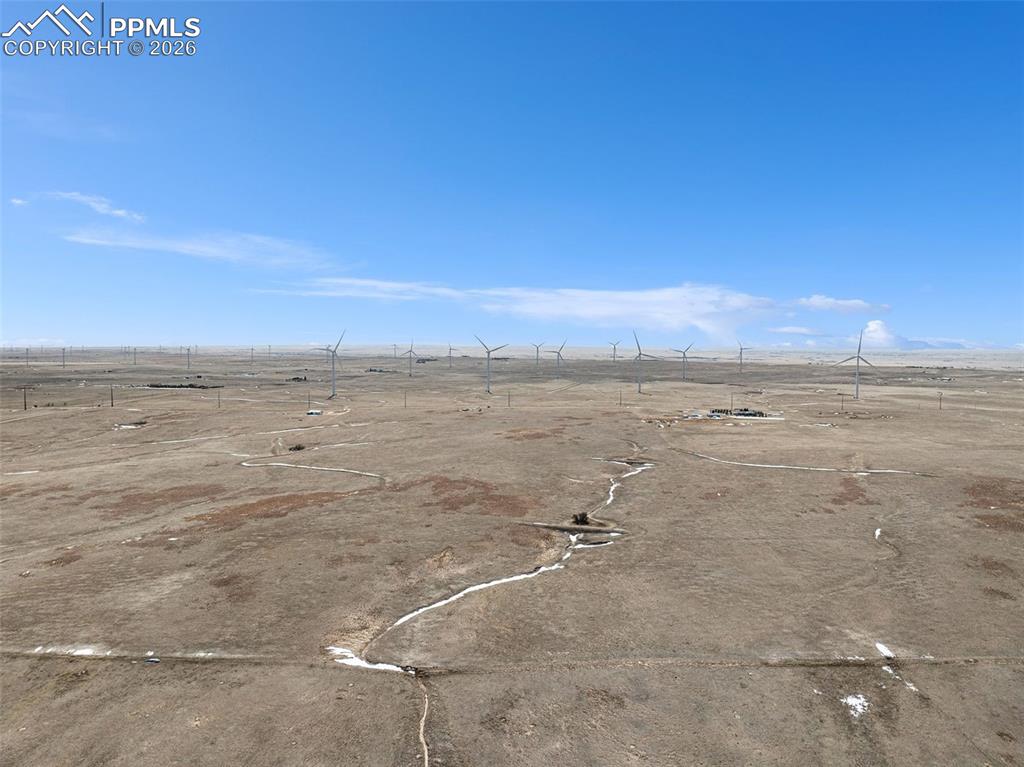 Image 12 of 17: View showing nearby utility poles along the roadway.