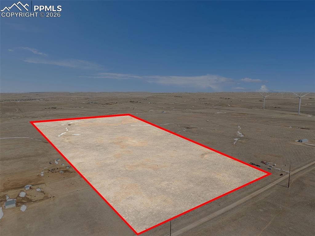 Image 3 of 17: View near a corner of the property; Property Lines are Approximate and not