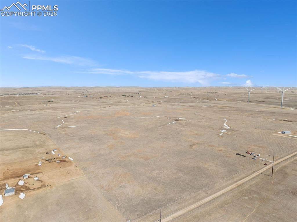 Image 4 of 17: View across the property illustrating open space and rural surroundings.