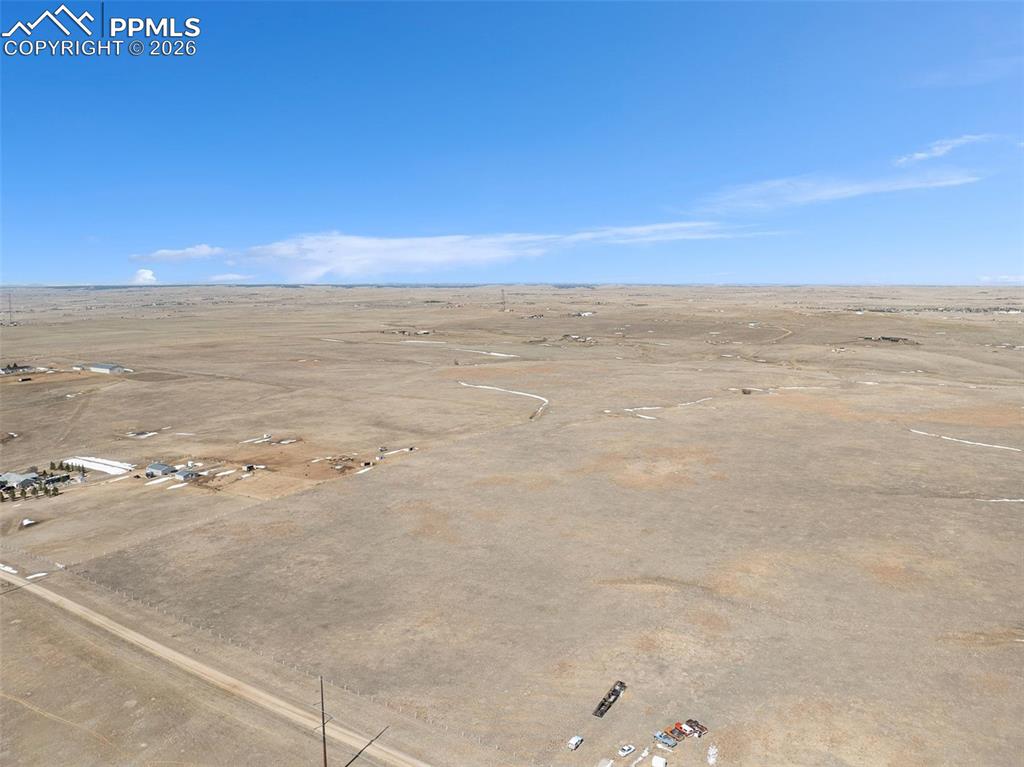 Image 9 of 17: Additional ground-level view of the property and surrounding area.