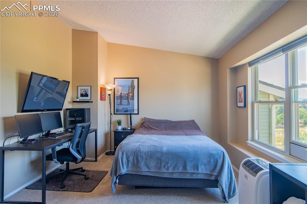 Image 18 of 33: Bedroom