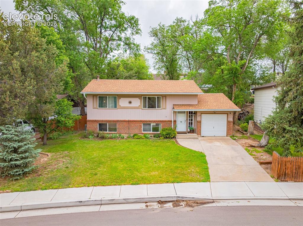 Image 1 of 32: Surrounded by towering mature trees and easy access to shopping, dining and